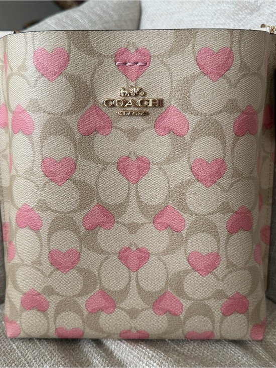 Coach Handbags - Coach Beige Signature Crossbody with Pink Heart Print